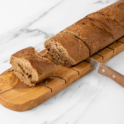 Tableau de coupe de baguette artisanale en bois d'olivier pour les amateurs de pain