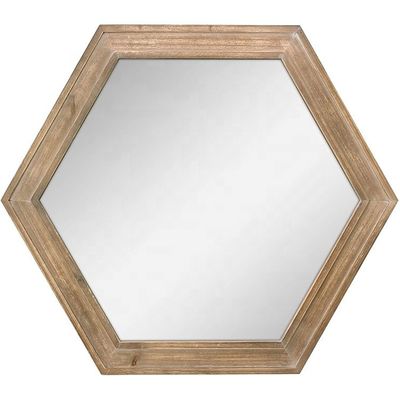 Décoration du salon de la ferme rustique miroir suspendu au mur en bois en plain colo