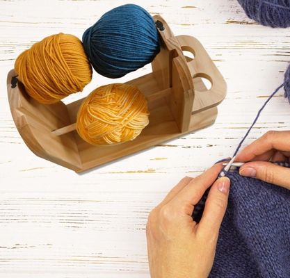 Porteur à double rotation pour le tricot à crochet distributeur à billes de fil à main