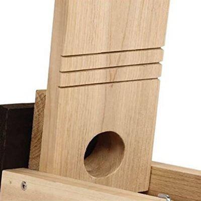 Château d'oiseaux en bois suspendu à l'extérieur avec gravure au laser