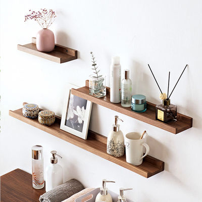 Étagère flottante en bois massif montée sur le mur