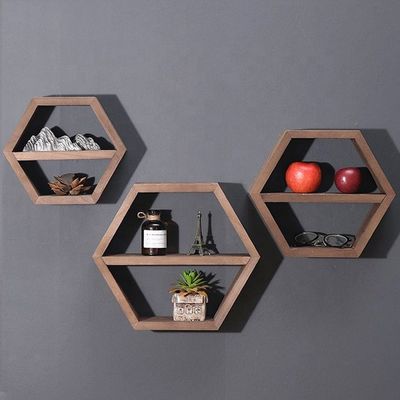 Étagères en bois en forme d'hexagone géométrique pour un organisateur de bureau de style moderne simple