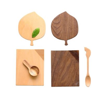 Des sous-vêtements en bois de noyer en forme de feuille de hêtre écologique pour les boissons chaudes