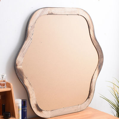 Miroir de chambre avec cadre ondulé et logo personnalisé