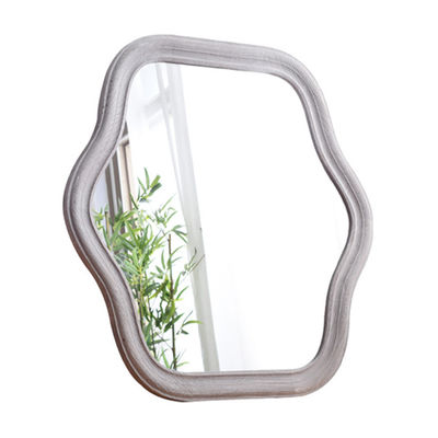 Miroir de chambre avec cadre ondulé et logo personnalisé